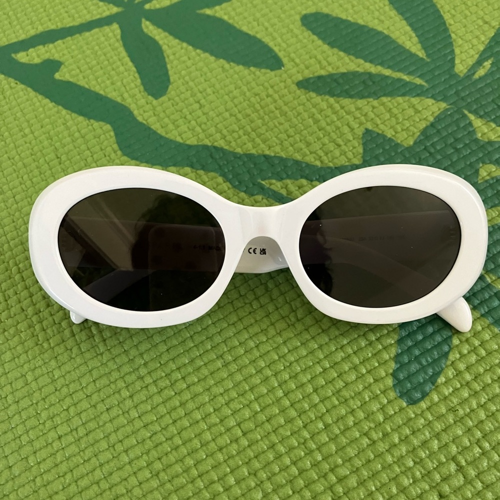 White oval sunglasses